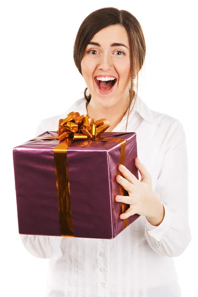 Young beautiful woman holding a present — Stock Photo, Image