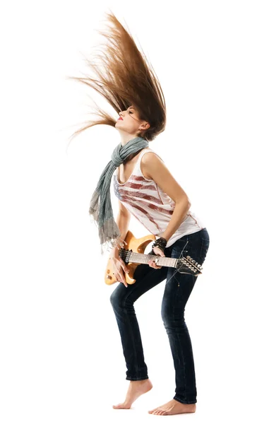 Wild girl playing electric guitar — Stock Photo, Image