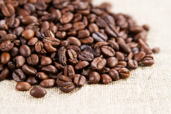 Koffie op een ruwe doek — Stockfoto