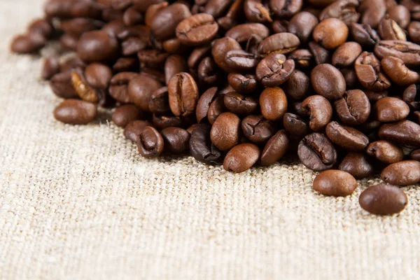 Koffie op een ruwe doek — Stockfoto