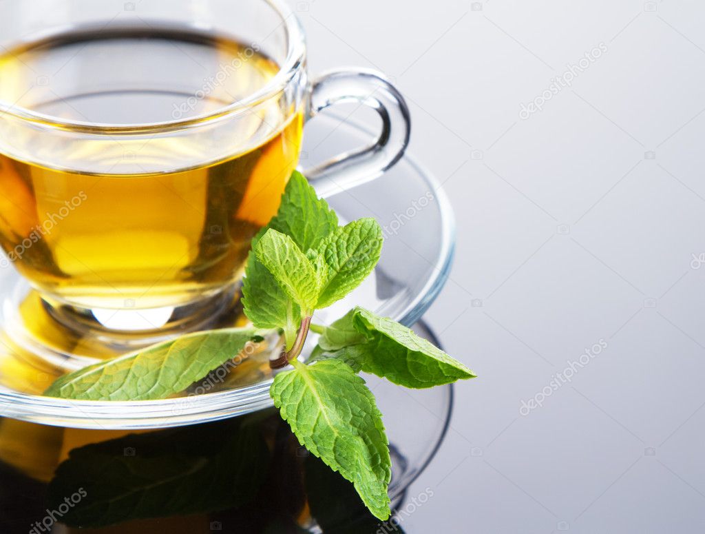 Tea cup with fresh mint leaves
