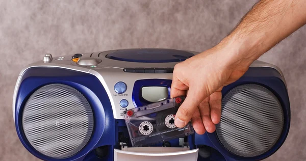 Inserting a cassette — Stock Photo, Image