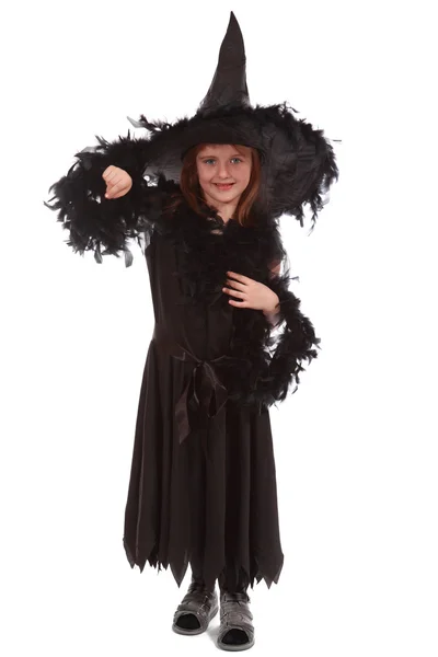 Witch in black dress and hat — Stock Photo, Image