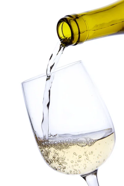 Розливу біле вино — стокове фото