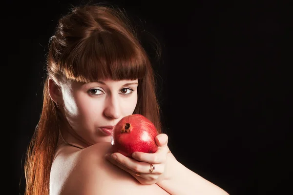 Das Mädchen mit dem roten Granatapfel — Stockfoto