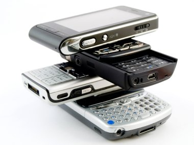 Stack Pile of Several Modern Cellphones clipart