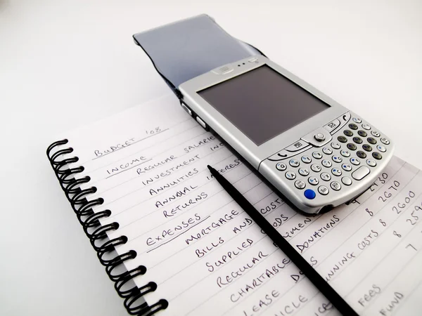 Smartphone PDA con stilo sul bilancio di casa — Foto Stock