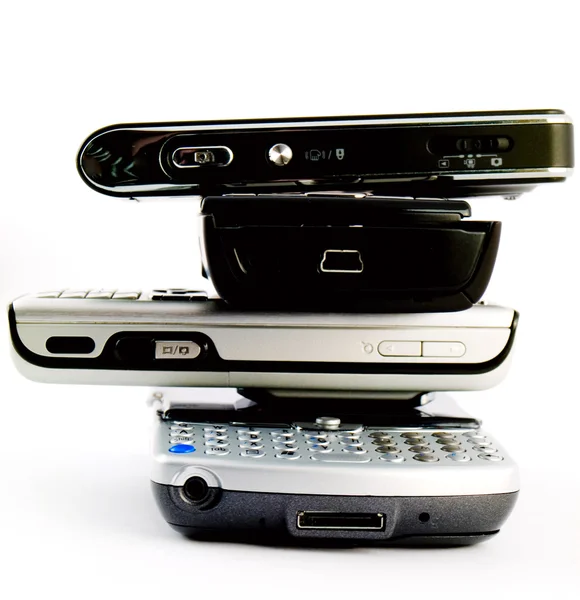 Pilha de pilha de vários celulares modernos — Fotografia de Stock