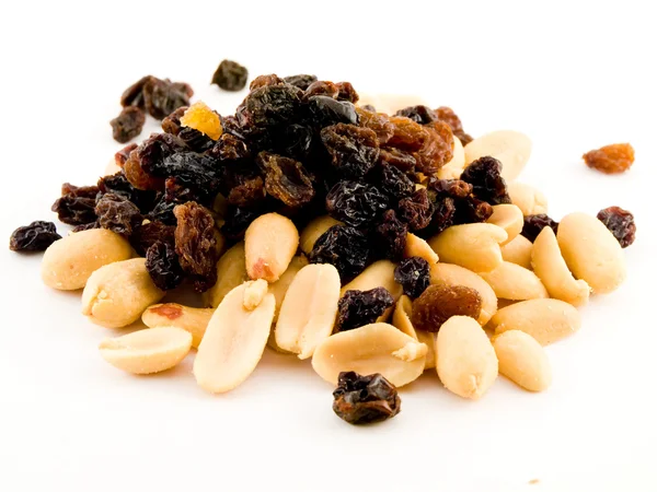 stock image Stack Pile of Peanuts and Raisins on White