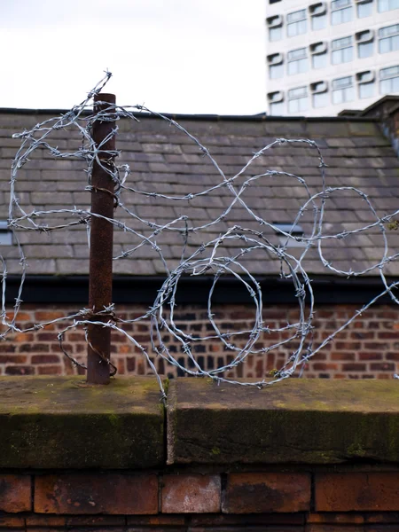 stock image Barbed Wire Protecting House