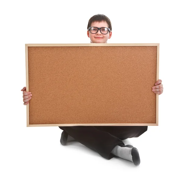 Young boy and empty bulletin board — Stock Photo, Image