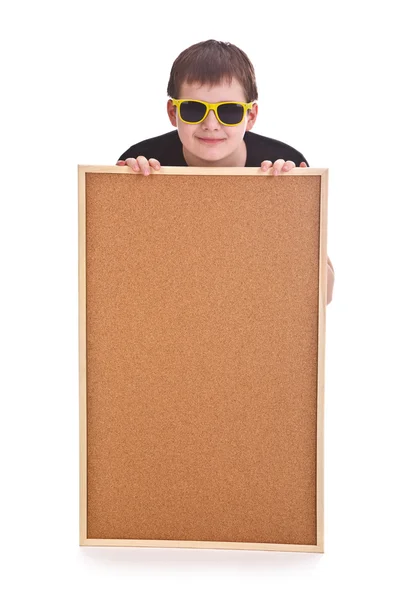 Young boy and empty bulletin board — Stock Photo, Image