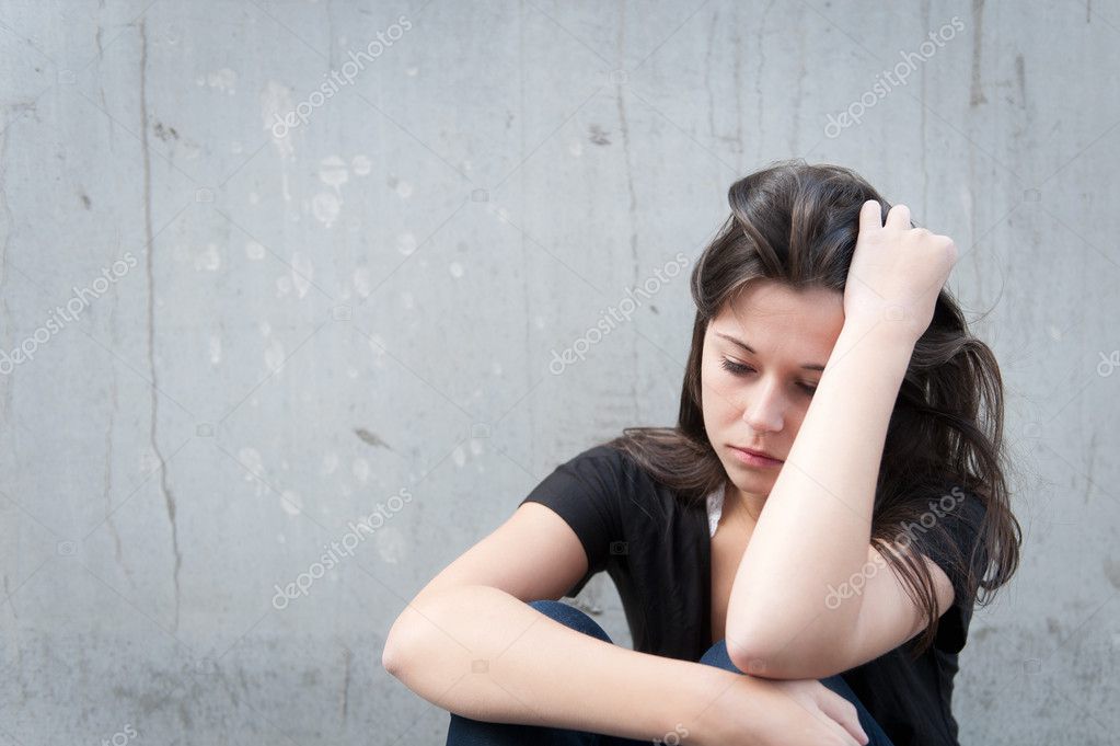 Teenage girl looking thoughtful about troubles — Stock Photo ...