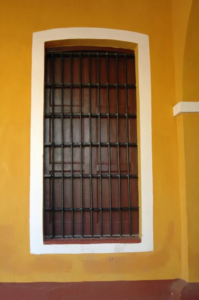 Window with grille — Stock Photo, Image