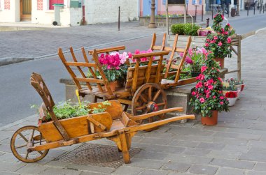 European town street with wooden flower pot clipart