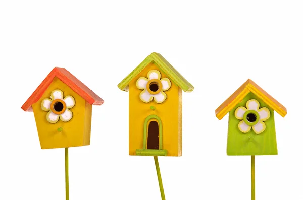 Drie kleurrijke starling-huizen geïsoleerd op wit — Stockfoto