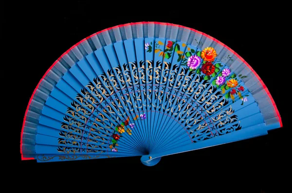 stock image China blue hand fan isolated on black