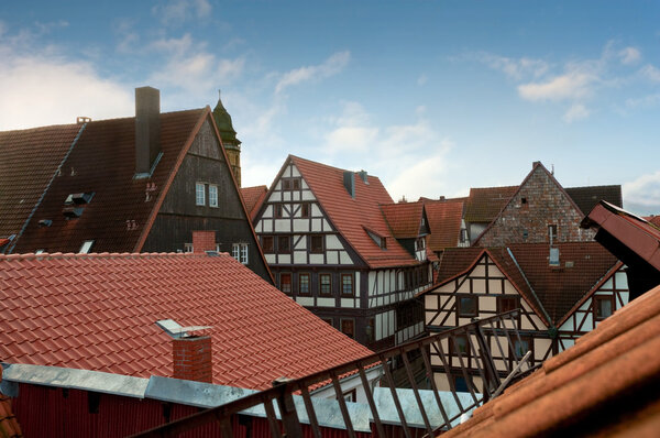 View over the tiled roofs of half-timbered houses in Germany