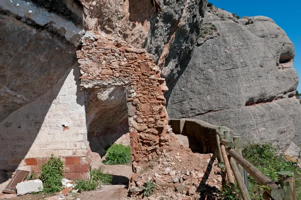 Old door remains in Montserrat mountain, Spain — Stock Photo, Image