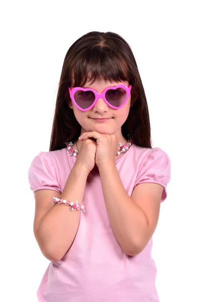 Kokietka młoda dziewczyna ubrana różowej sukience i okulary — Zdjęcie stockowe