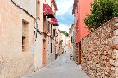 Hostel on a medieval street, Spain clipart