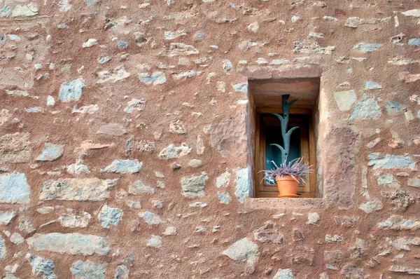 Pot in a window, Collbato, Spain — Stock Photo, Image