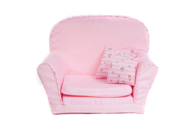 Fauteuil rose confortable avec deux oreillers dessus — Photo