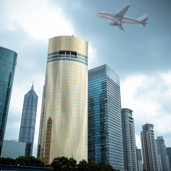 Modern building with airplane — Stock Photo, Image