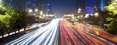 Modern cityscape in beijing at night clipart