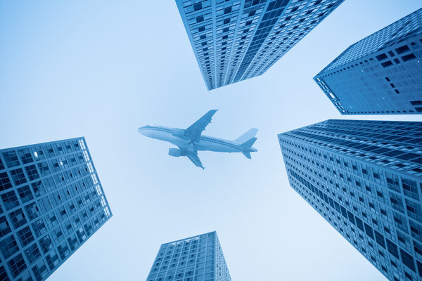 Airplane and modern building