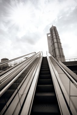 Moving escalator in city outdoor clipart