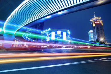 Center of downtown shanghai at night clipart