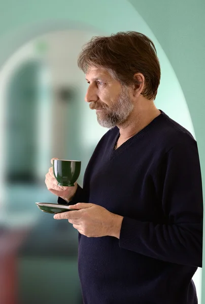 Man holding a cup — Stock Photo, Image