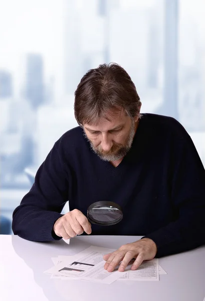 stock image Man studies the financial report