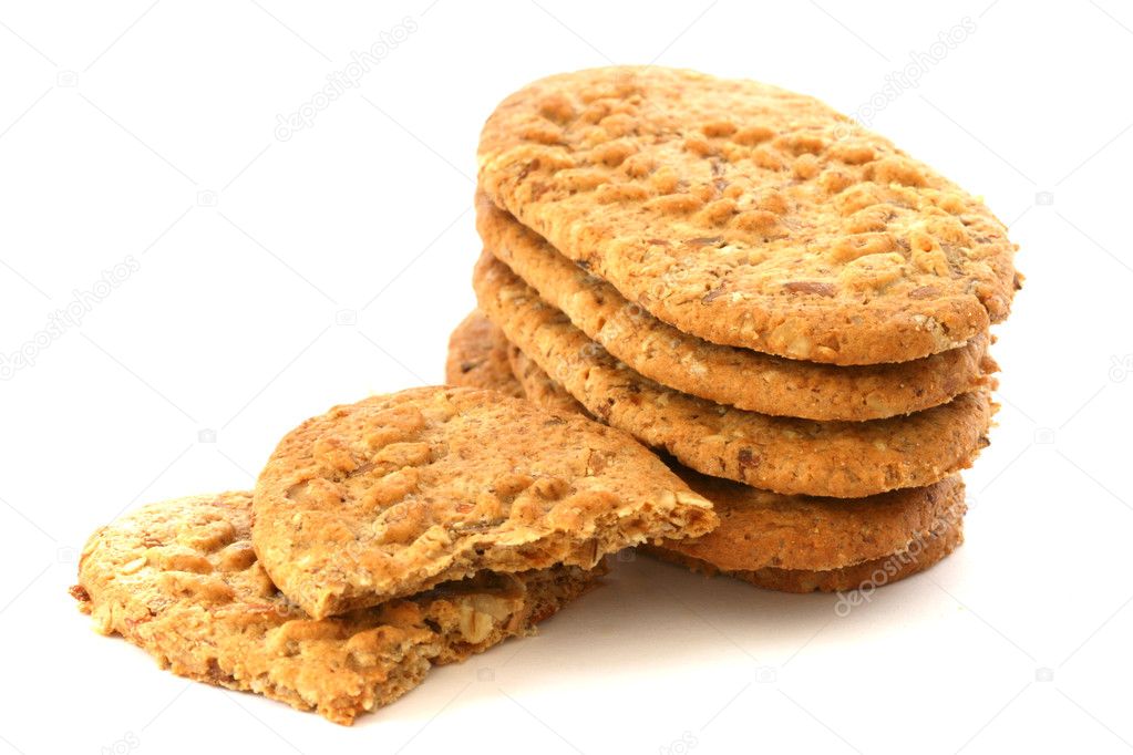 Whole grain biscuits on white background