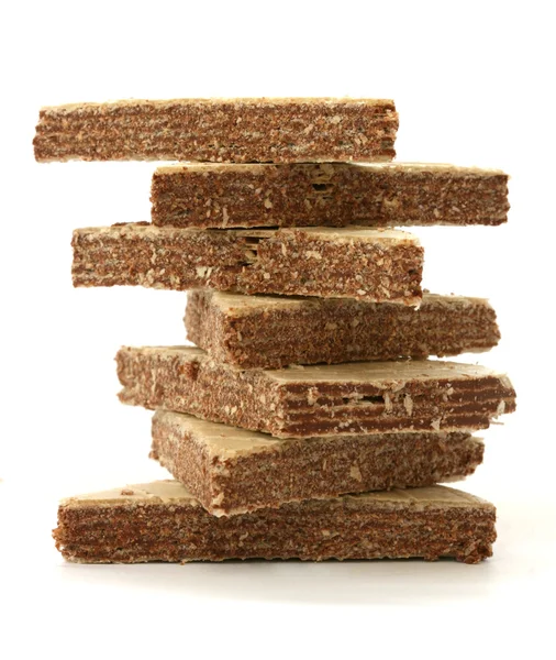 Stack of chocolate filled wafers on white background — Stock Photo, Image