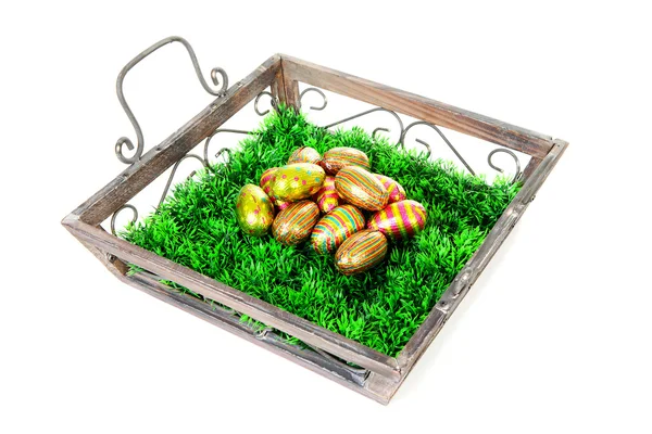 Wooden tray with easter eggs — Stock Photo, Image