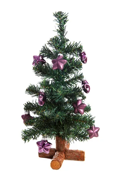 Plastic christmas tree with purple stars — Stock Photo, Image