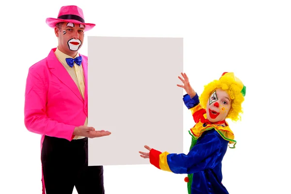 Two clowns holding empty text board — Stock Photo, Image