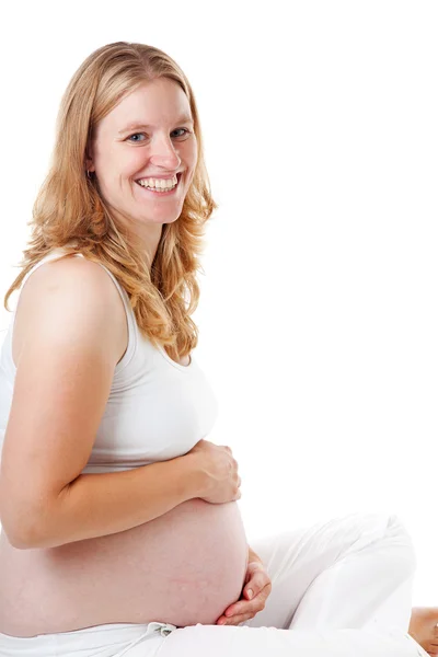 Gravida kvinnor hålla magen — Stockfoto