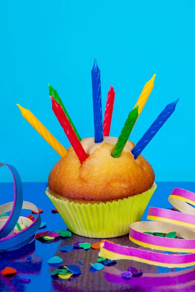 Birthday cupcake with lots of candles — Stock Photo, Image