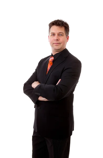 Businessman is looking at camera with arms crossed — Stock Photo, Image