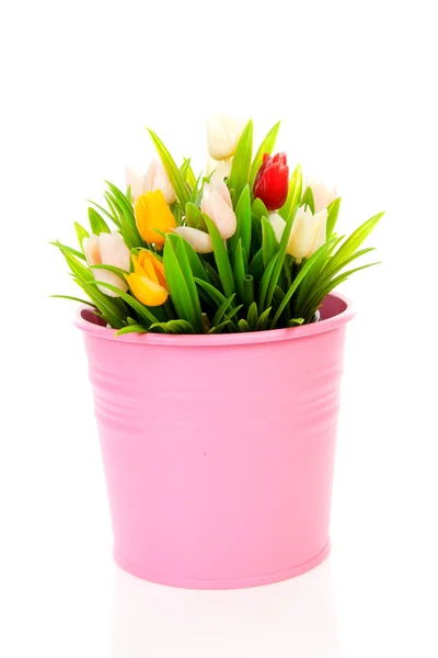 Bukiet tworzyw sztucznych holenderskich tulipanów w puli różowy — Zdjęcie stockowe