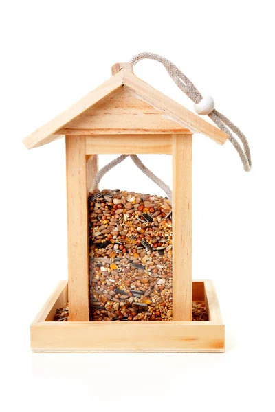 Casa de alimentador de pássaros de madeira — Fotografia de Stock