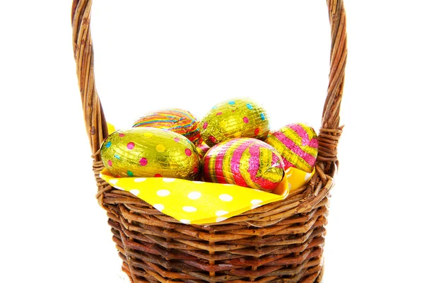 Cane basket with easter eggs in closeup — Stock Photo, Image