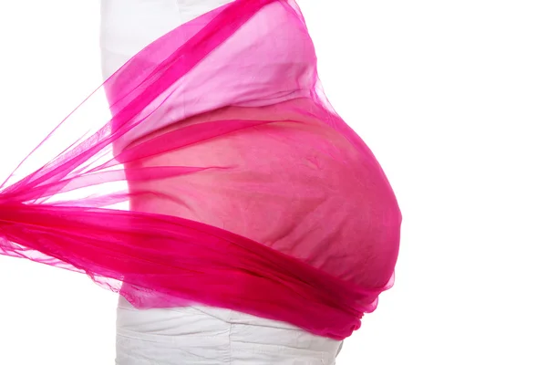 stock image Closeup of pregnant belly with pink cloth