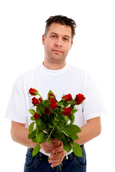 Bello uomo sta dando mazzo di rose — Foto Stock