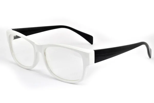 Modern glasses with reflection over white background — Stock Photo, Image