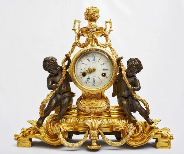 Alte Mode antike Uhr isoliert auf weiß Stockbild