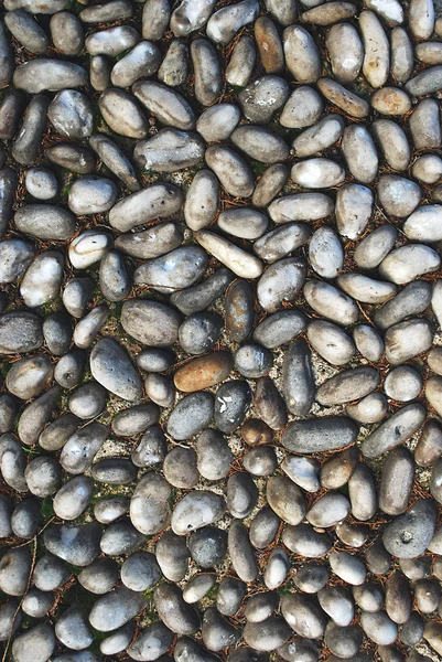 Bestrating gemaakt van stenen als abstracte achtergrond — Stockfoto